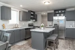 The THE EAGLE 60 Kitchen. This Manufactured Mobile Home features 3 bedrooms and 2 baths.