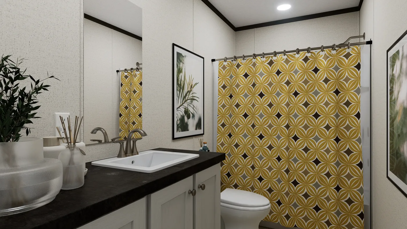 The VENTURE Guest Bathroom. This Manufactured Mobile Home features 4 bedrooms and 2 baths.