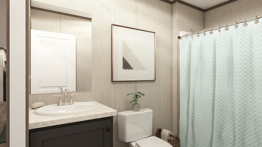 The LEGEND 28X56 3 BR Guest Bathroom. This Manufactured Mobile Home features 3 bedrooms and 2 baths.