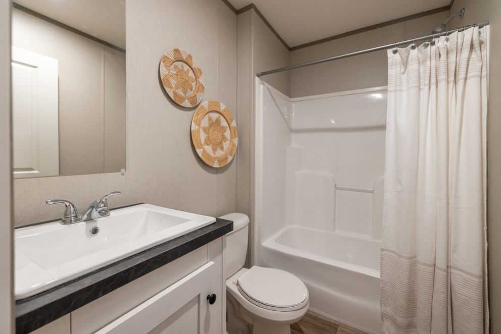 The HORIZON NORTHSTAR 16763A Guest Bathroom. This Manufactured Mobile Home features 3 bedrooms and 2 baths.