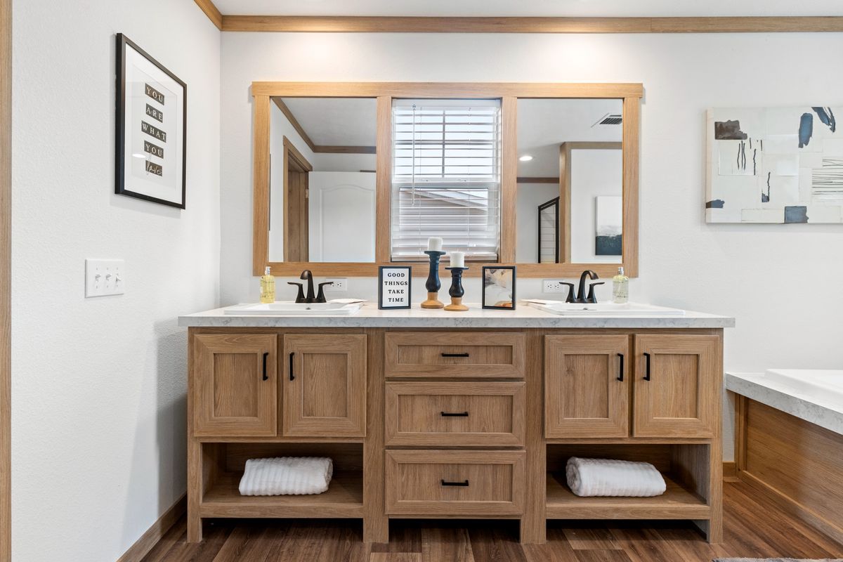The THATCHER Primary Bathroom. This Manufactured Mobile Home features 4 bedrooms and 2 baths.