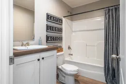 The TRADITION 2868B Guest Bathroom. This Manufactured Mobile Home features 4 bedrooms and 2 baths.