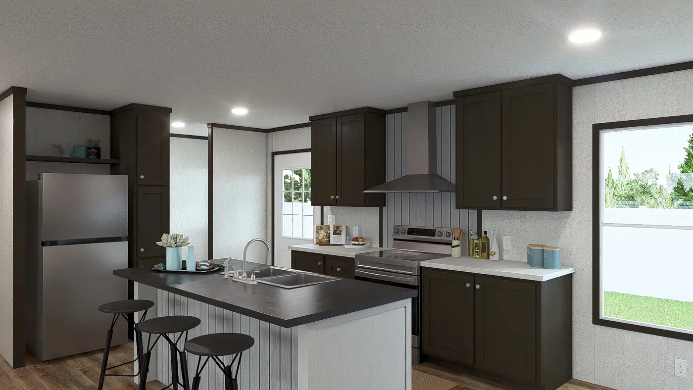 The DISCOVER Kitchen. This Manufactured Mobile Home features 3 bedrooms and 2 baths.