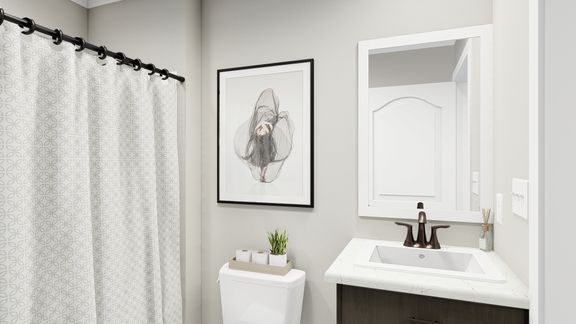 The THE ALEXANDER Guest Bathroom. This Manufactured Mobile Home features 3 bedrooms and 2 baths.