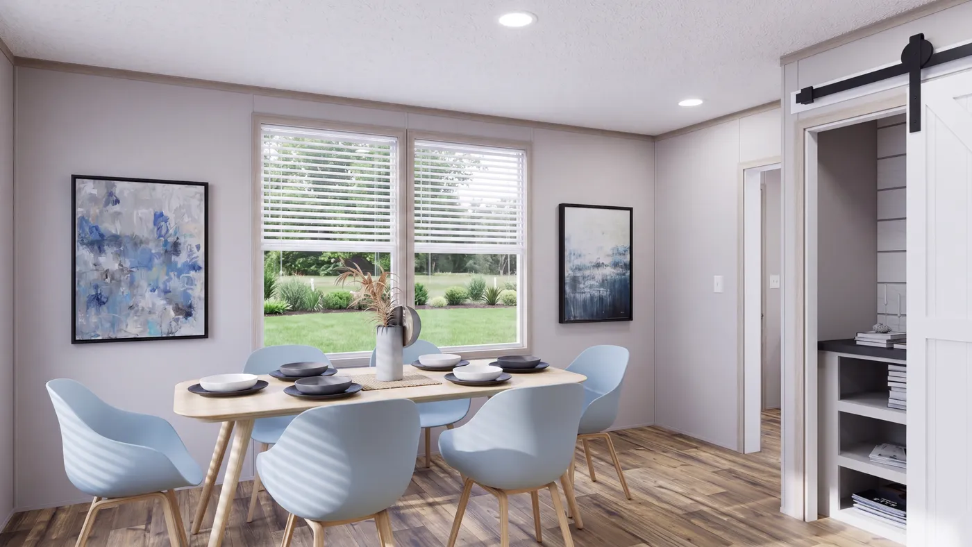 The MOUNTAIN BREEZE 3260 Dining Area. This Manufactured Mobile Home features 3 bedrooms and 2 baths.
