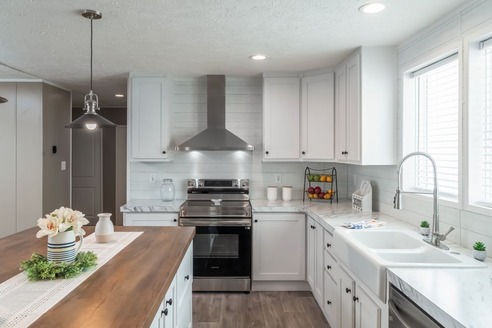 The ISLAND BREEZE Kitchen. This Manufactured Mobile Home features 3 bedrooms and 2 baths.