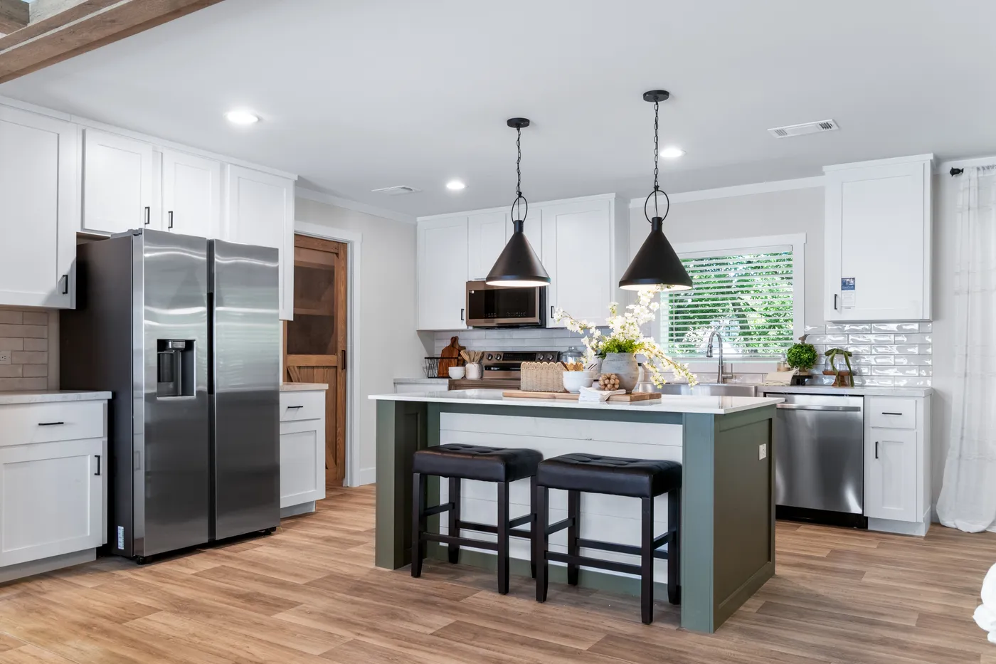 The FARM 4 FLEX ELITE Kitchen. This Manufactured Mobile Home features 4 bedrooms and 3 baths.