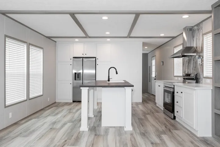 The PLATINUM ANNIVERSARY Kitchen. This Manufactured Mobile Home features 3 bedrooms and 2 baths.