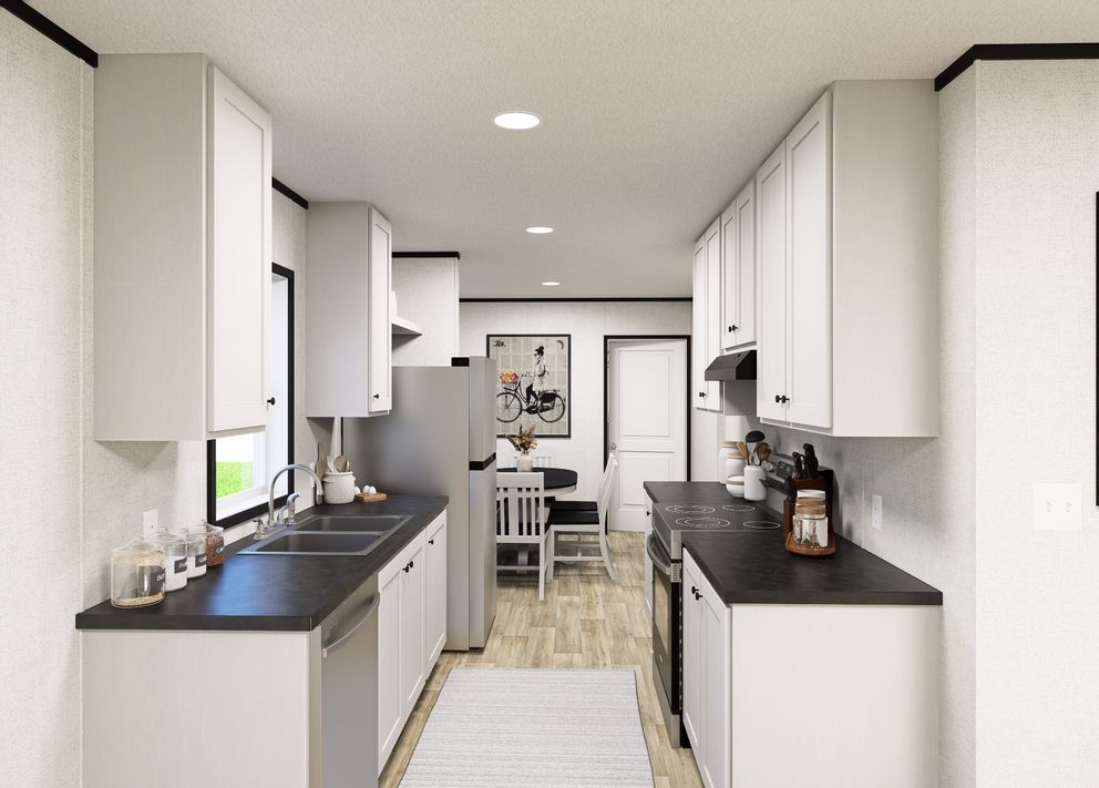 The NORTHSTAR Kitchen. This Manufactured Mobile Home features 3 bedrooms and 2 baths.