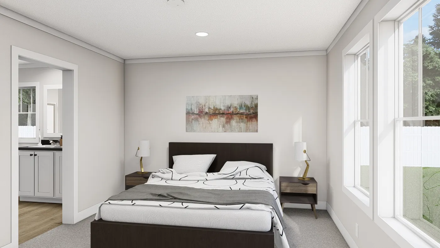 The WHOLE LOTTA LOVE Primary Bedroom. This Manufactured Mobile Home features 3 bedrooms and 2 baths.