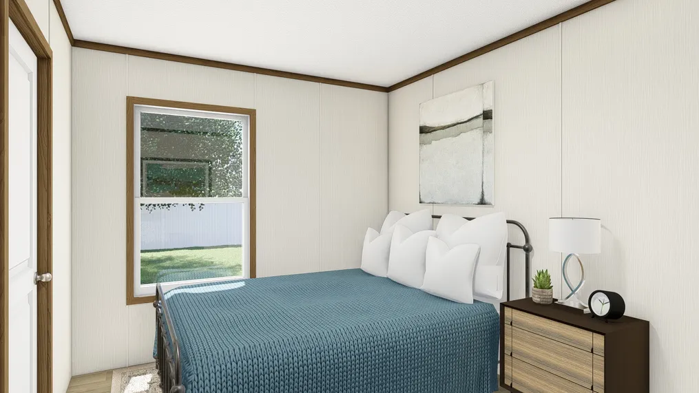 The THE OCCASION Bedroom. This Manufactured Mobile Home features 4 bedrooms and 2 baths.