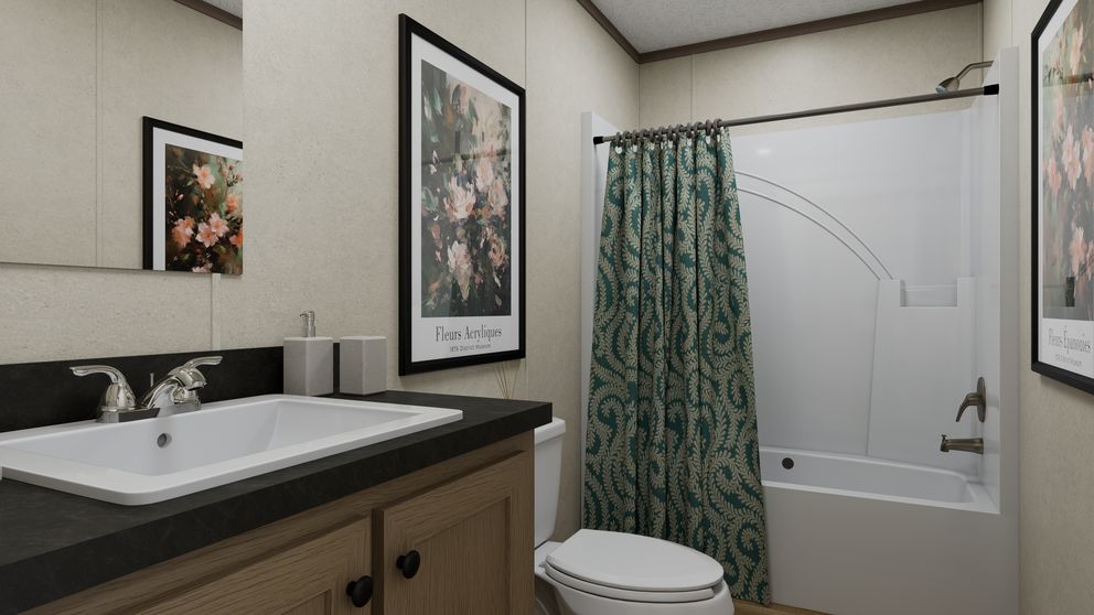The 4816-CC05 OASIS 48 Primary Bathroom. This Manufactured Mobile Home features 2 bedrooms and 1 bath.