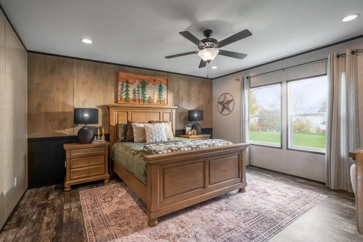 The THE TRIBUTARY Primary Bedroom. This Manufactured Mobile Home features 3 bedrooms and 2 baths.