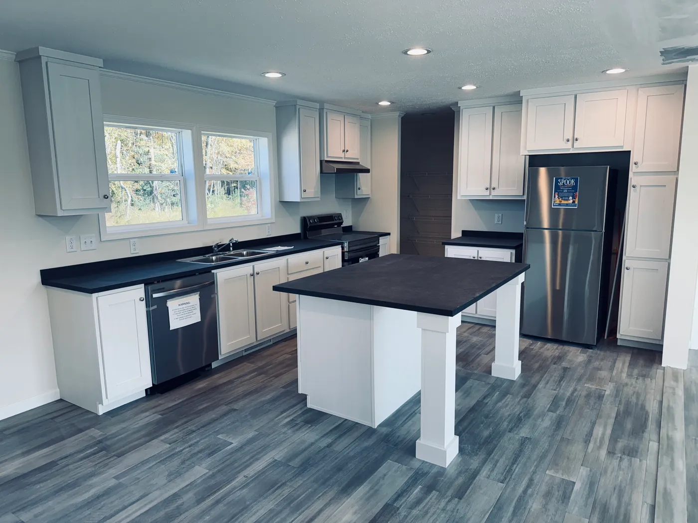 The TOURMALINE 7628-649 Kitchen. This Manufactured Mobile Home features 4 bedrooms and 2 baths.