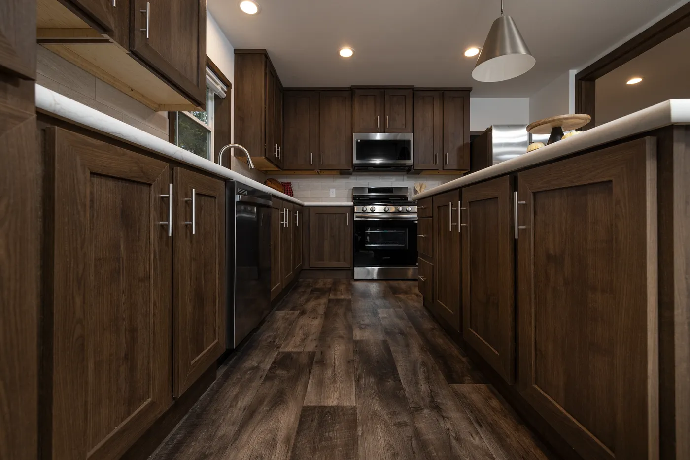 The RAMSEY 75 Kitchen. This Manufactured Mobile Home features 4 bedrooms and 2 baths.