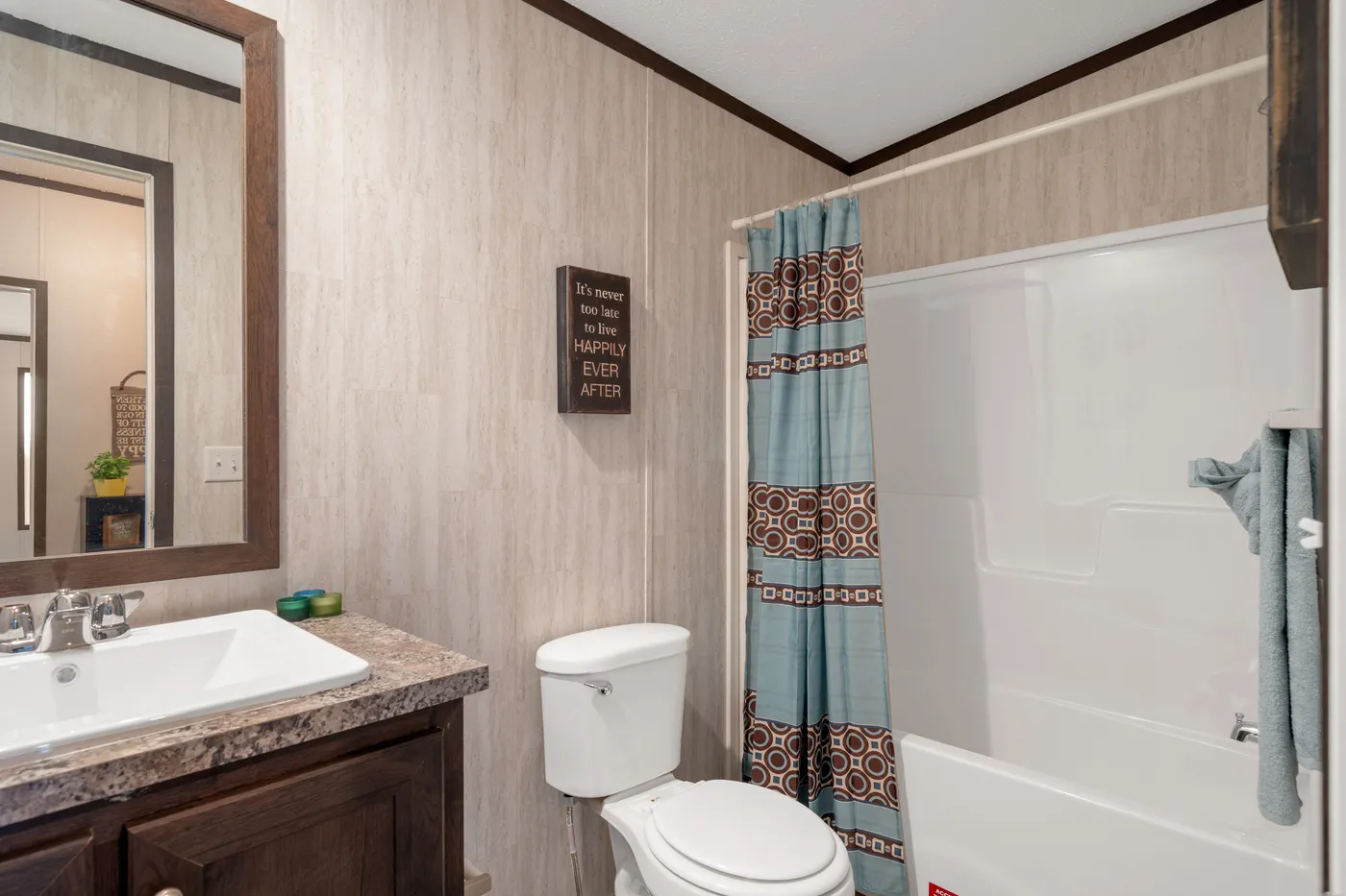 The GARNET Guest Bathroom. This Manufactured Mobile Home features 3 bedrooms and 2 baths.