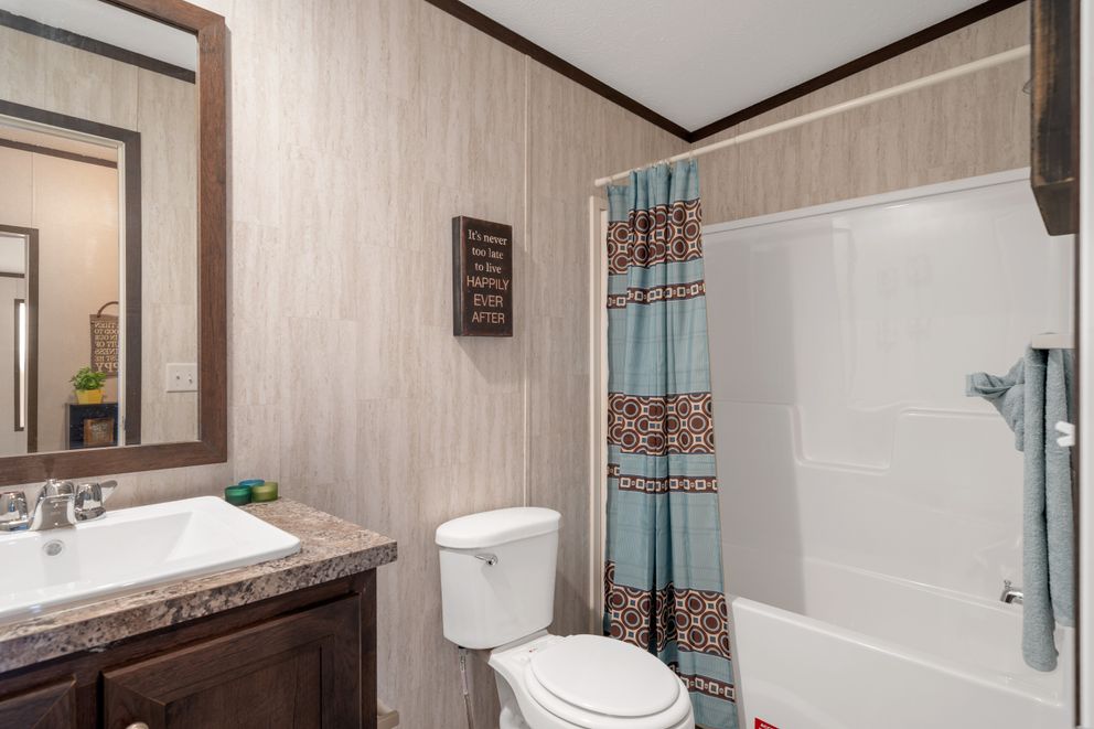 The GARNET Guest Bathroom. This Manufactured Mobile Home features 3 bedrooms and 2 baths.