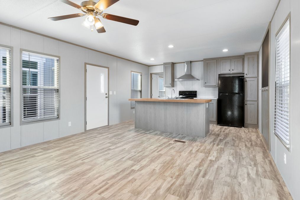 The BREEZE 16602A Kitchen. This Manufactured Mobile Home features 2 bedrooms and 2 baths.