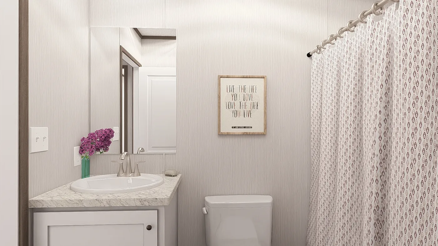 The LEGEND ANNIVERSARY 16X76 Guest Bathroom. This Manufactured Mobile Home features 3 bedrooms and 2 baths.