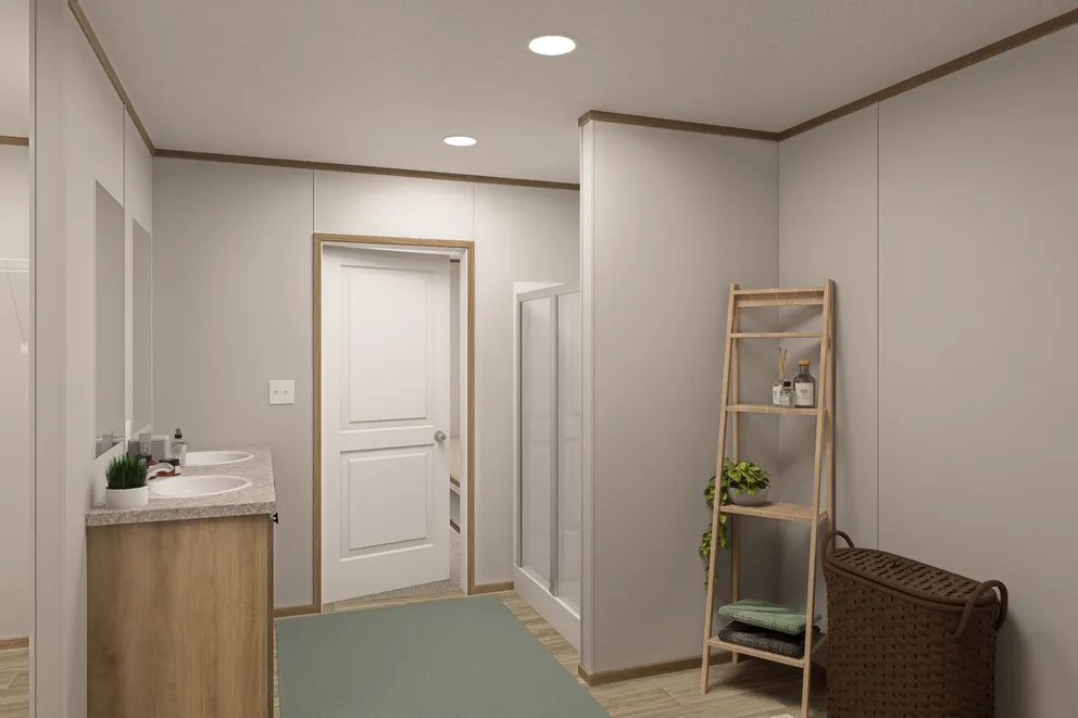 The THE EAGLE 60 Primary Bathroom. This Manufactured Mobile Home features 3 bedrooms and 2 baths.