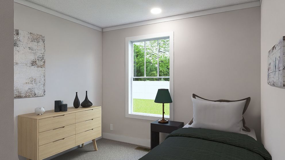 The WHOLE LOTTA LOVE Guest Bedroom. This Manufactured Mobile Home features 3 bedrooms and 2 baths.