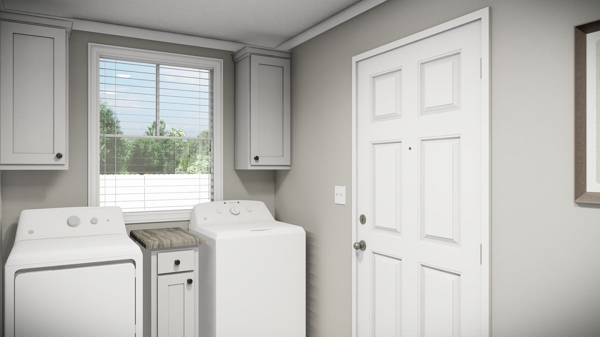 The THE REVERE Utility Room. This Manufactured Mobile Home features 4 bedrooms and 2 baths.