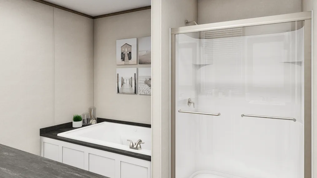 The THE SOUTHERN FARMHOUSE Primary Bathroom. This Manufactured Mobile Home features 3 bedrooms and 2 baths.