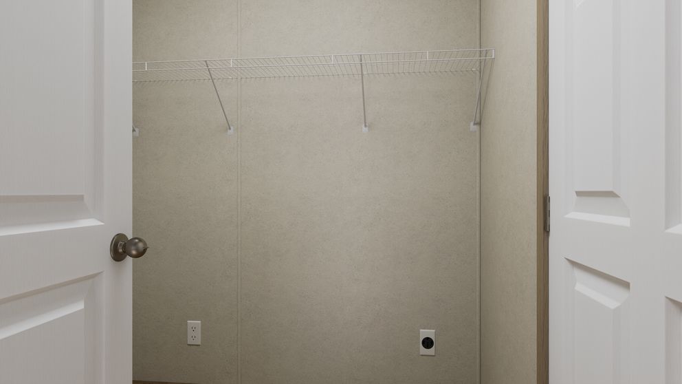 The 4824-CC54 OAKSTEAD 48 Utility Room. This Manufactured Mobile Home features 3 bedrooms and 2 baths.
