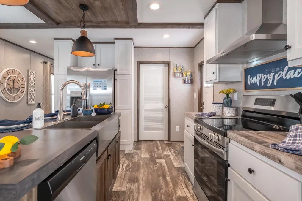 The LIBERTY Kitchen. This Manufactured Mobile Home features 3 bedrooms and 2 baths.