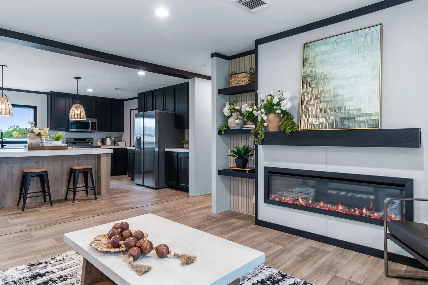 The ODYSSEY Living Room. This Manufactured Mobile Home features 4 bedrooms and 2 baths.