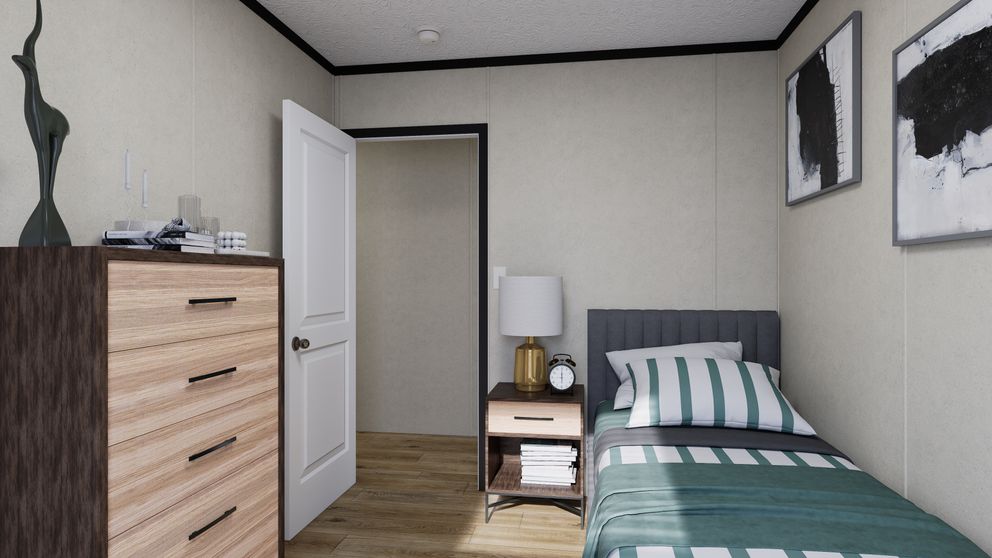 The 7616-CC03 HARBORVIEW 76 Guest Bedroom. This Manufactured Mobile Home features 3 bedrooms and 2 baths.