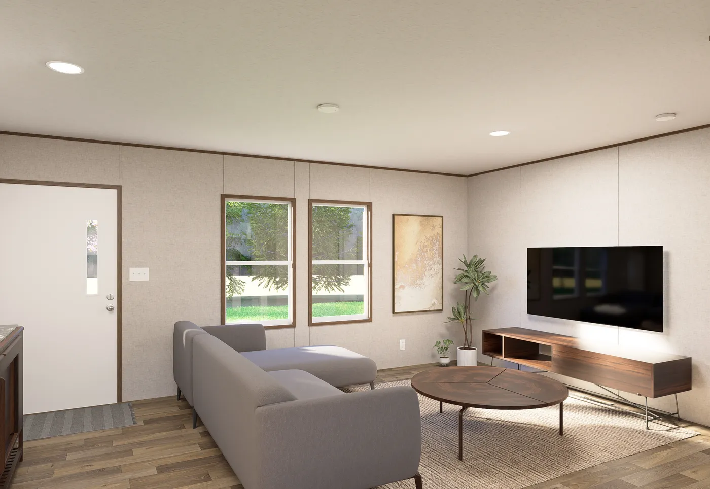 The CEDAR Living Room. This Manufactured Mobile Home features 3 bedrooms and 2 baths.