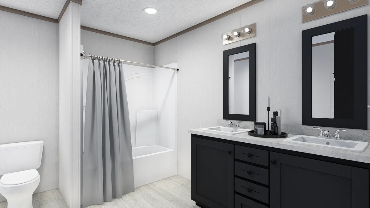 The 4824-E734 THE PULSE Primary Bathroom. This Manufactured Mobile Home features 3 bedrooms and 2 baths.
