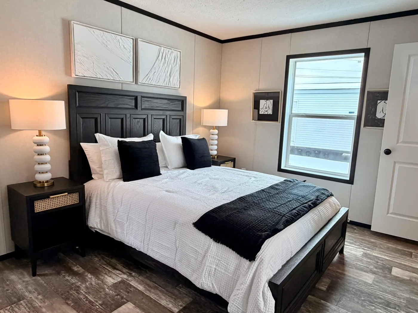 The PEARL Primary Bedroom. This Manufactured Mobile Home features 3 bedrooms and 2 baths.