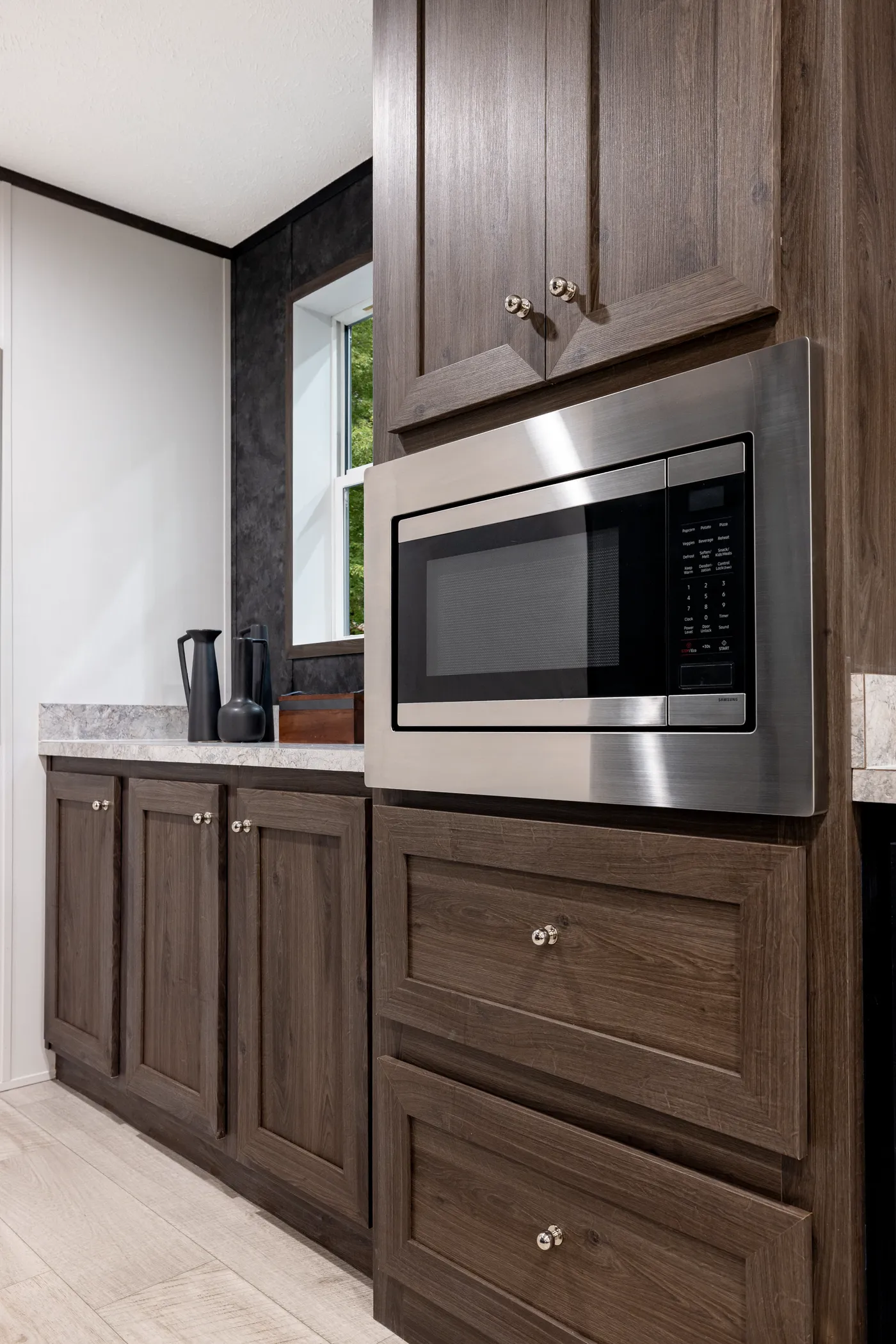The CRESTWOOD Kitchen. This Manufactured Mobile Home features 3 bedrooms and 2 baths.