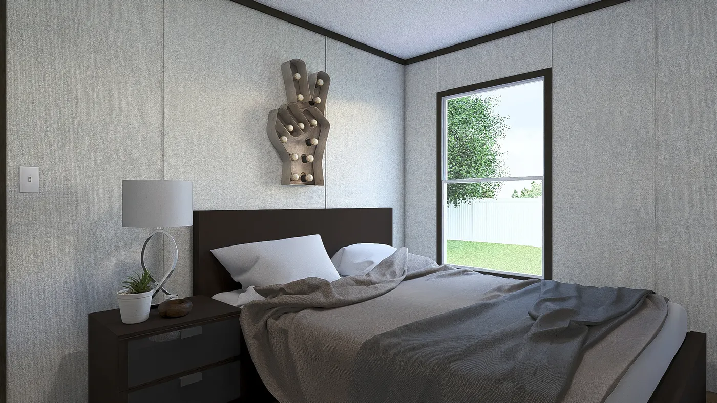 The IMPACT Guest Bedroom. This Manufactured Mobile Home features 4 bedrooms and 2 baths.
