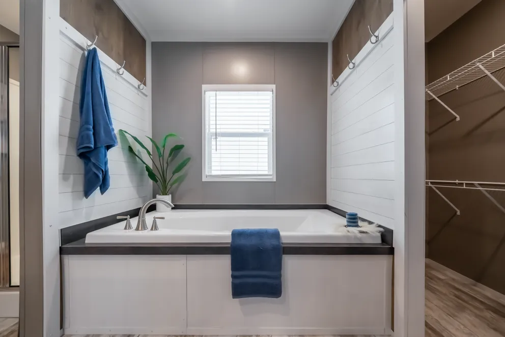 The LIBERTY Primary Bathroom. This Manufactured Mobile Home features 3 bedrooms and 2 baths.