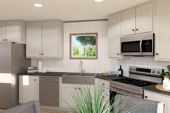 The ULTRA A-PLUS 16X76 Kitchen. This Manufactured Mobile Home features 3 bedrooms and 2 baths.