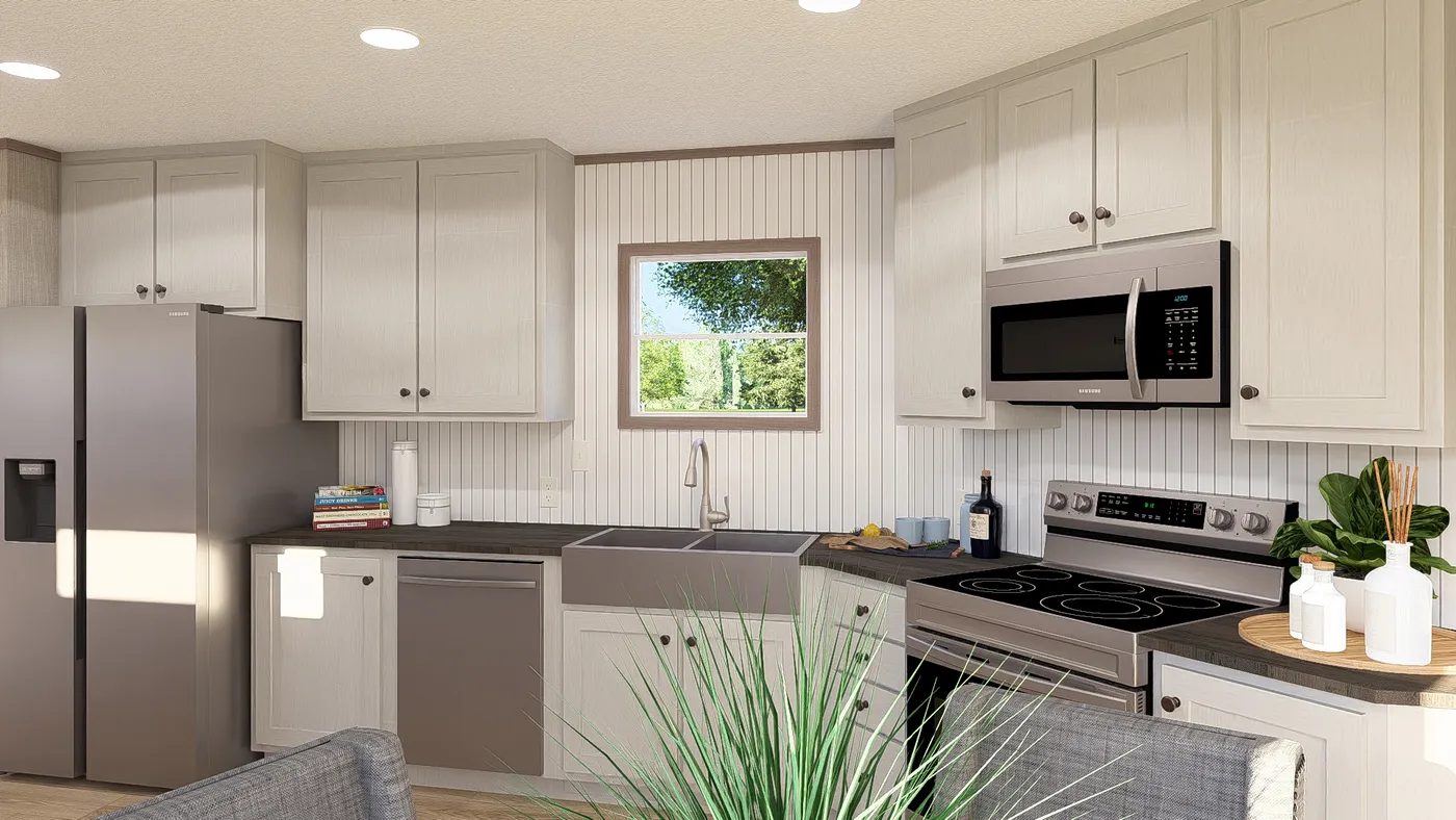 The ULTRA A-PLUS 16X76 Kitchen. This Manufactured Mobile Home features 3 bedrooms and 2 baths.
