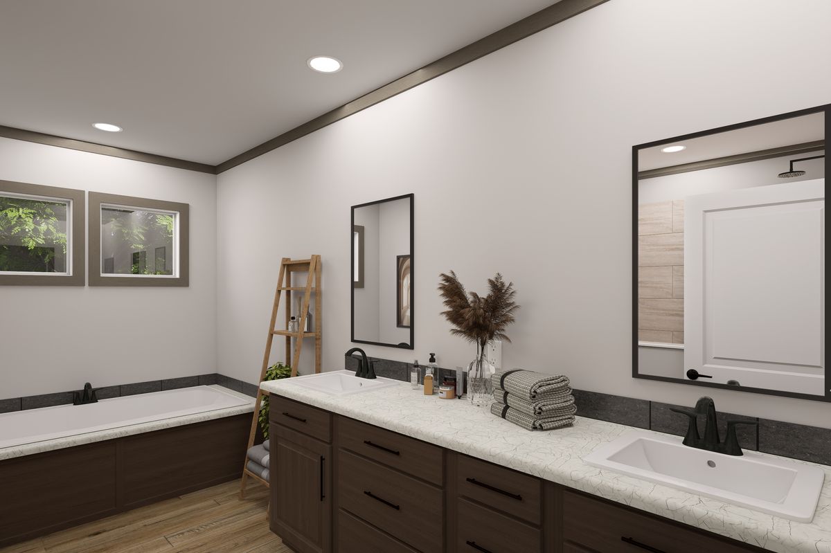 The EASY LIVIN' Primary Bathroom. This Manufactured Mobile Home features 3 bedrooms and 2 baths.