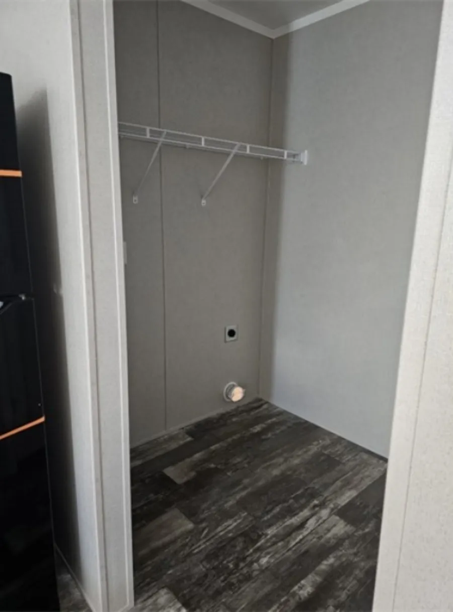 The TOPAZ Utility Room. This Manufactured Mobile Home features 3 bedrooms and 2 baths.