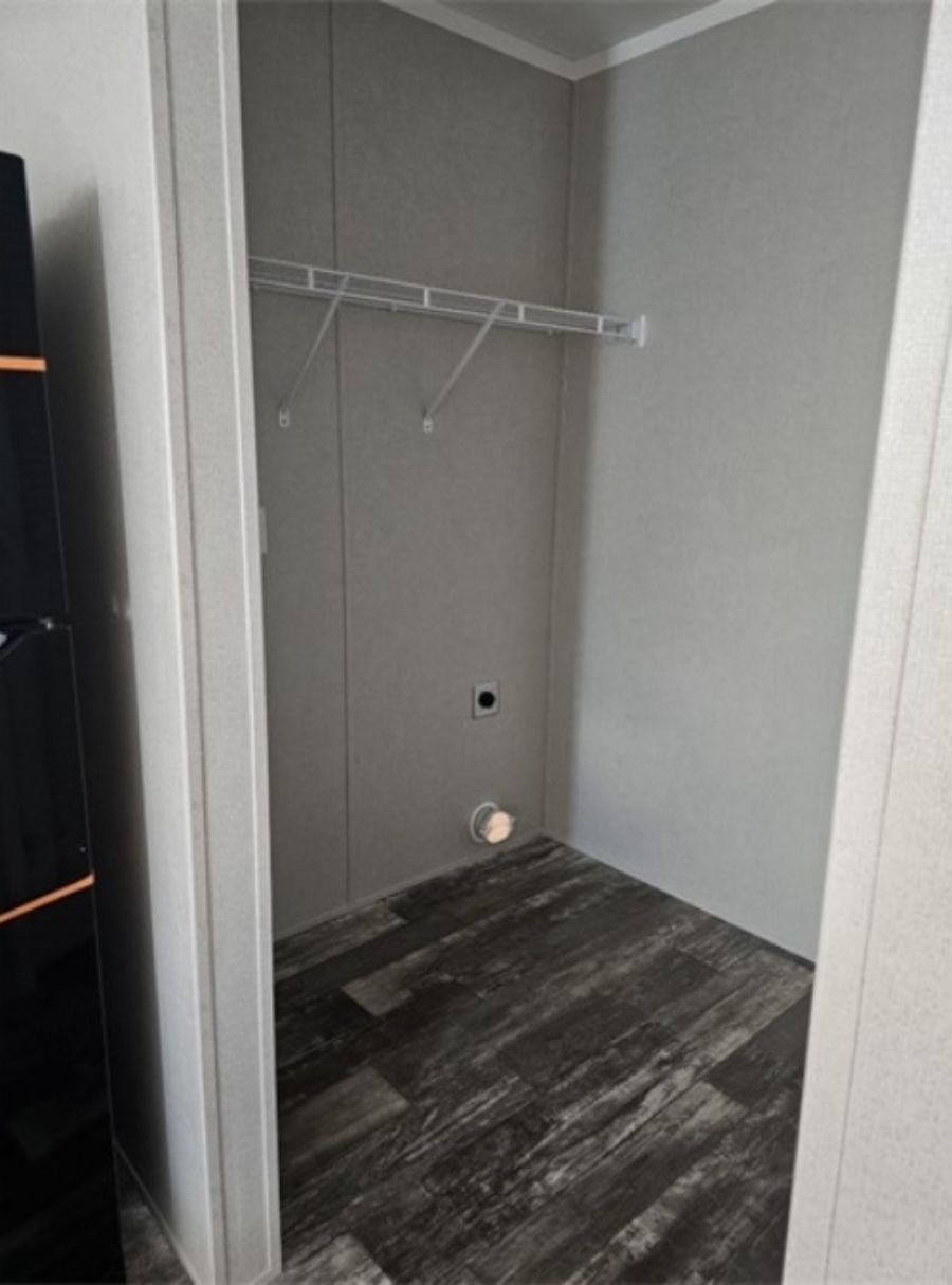 The TOPAZ Utility Room. This Manufactured Mobile Home features 3 bedrooms and 2 baths.