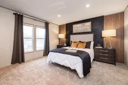 The THE DARK SANDS Primary Bedroom. This Manufactured Mobile Home features 3 bedrooms and 2 baths.