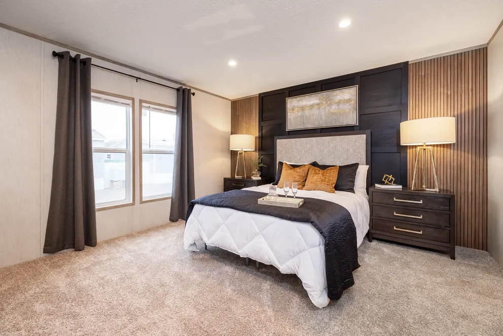 The THE DARK SANDS Primary Bedroom. This Manufactured Mobile Home features 3 bedrooms and 2 baths.