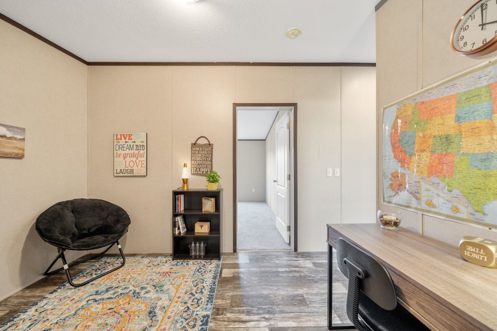 The GARNET Flex. This Manufactured Mobile Home features 3 bedrooms and 2 baths.