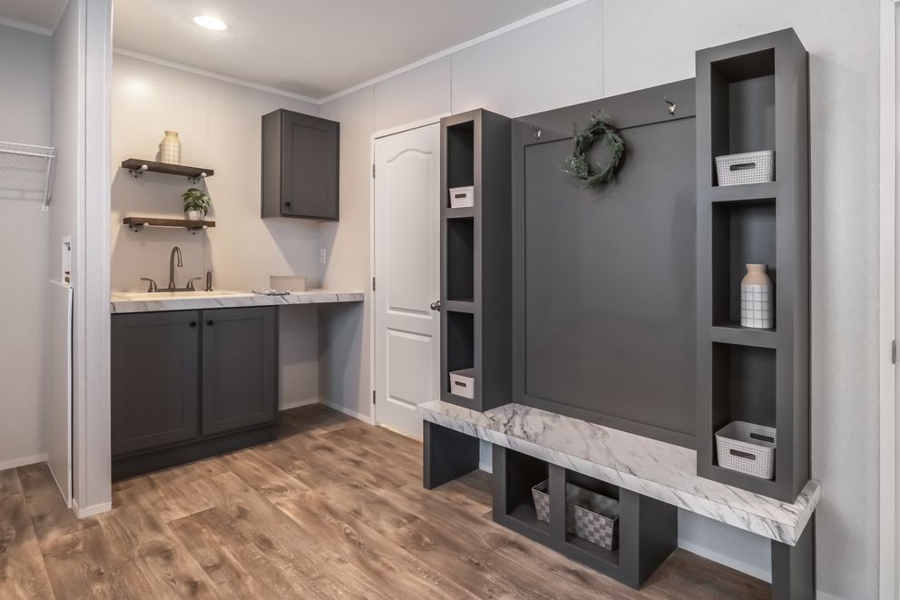 The THE FUSION 32B Utility Room. This Manufactured Mobile Home features 4 bedrooms and 2 baths.