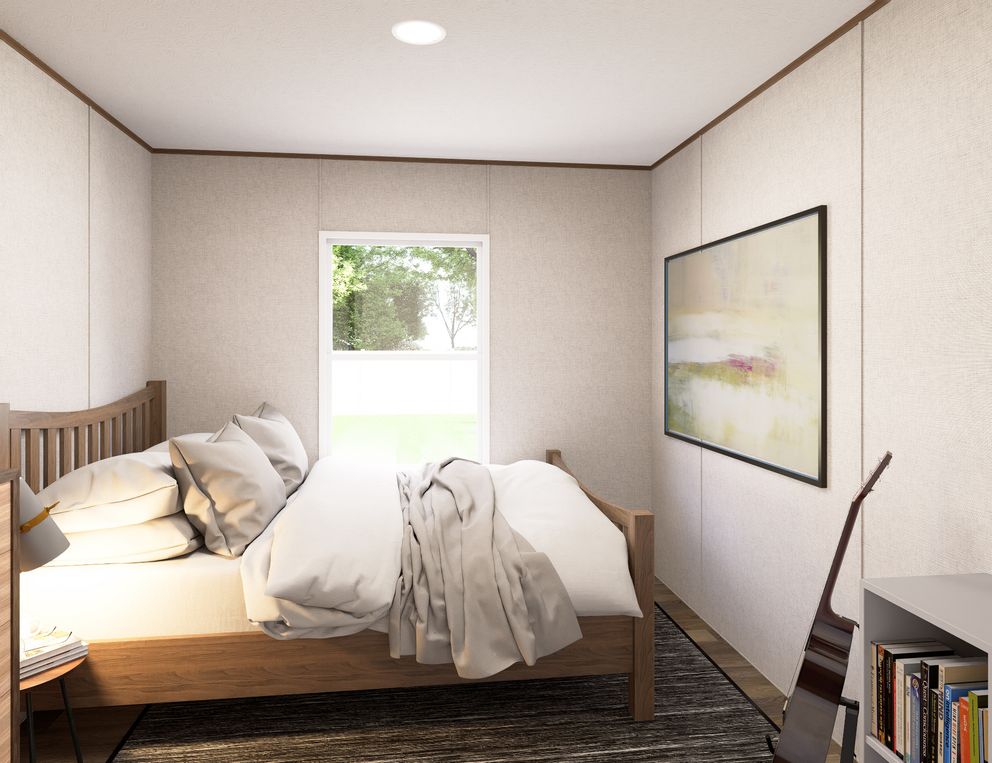 The MAPLE Guest Bedroom. This Manufactured Mobile Home features 3 bedrooms and 2 baths.