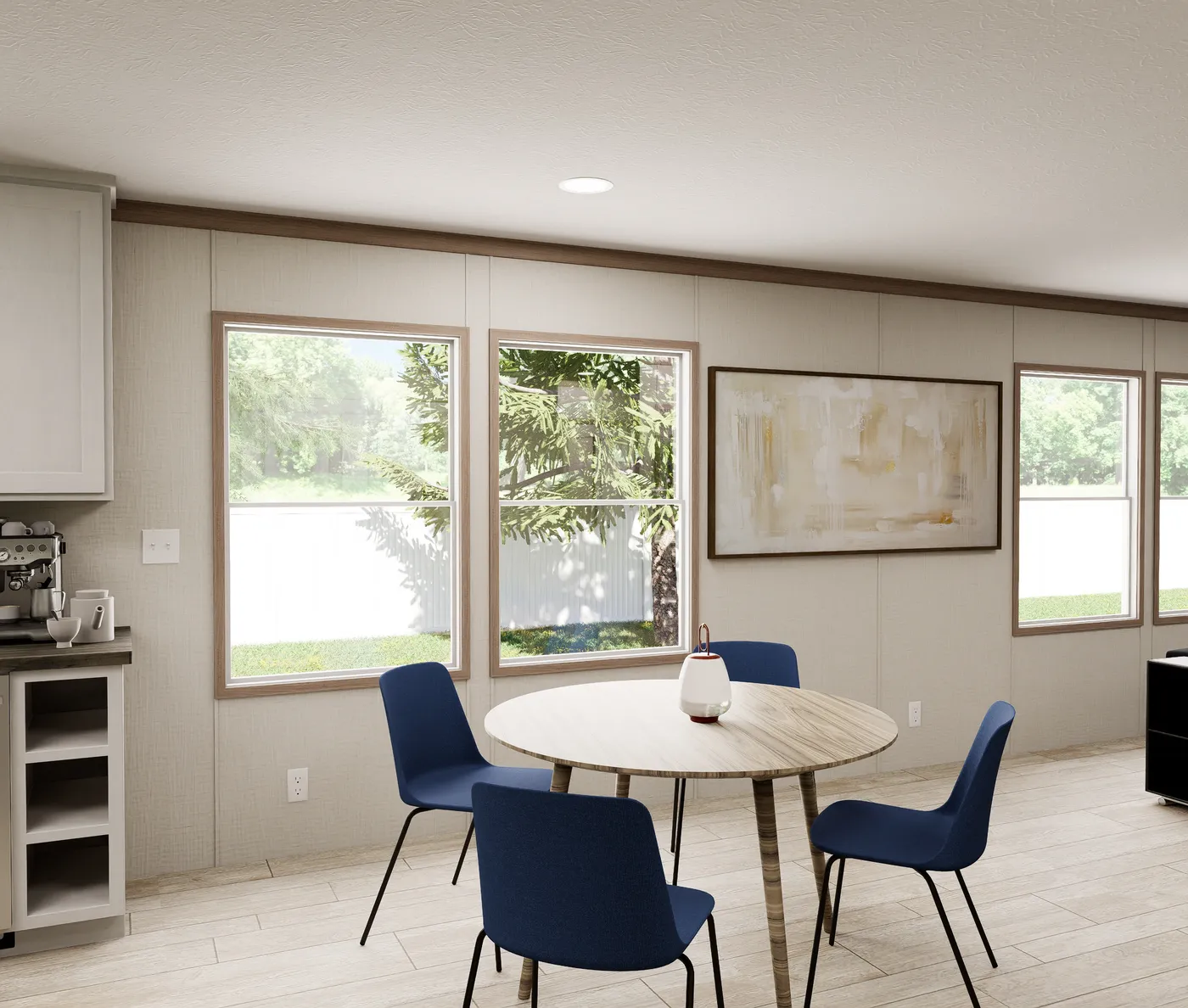 The ULTRA FLEX 60 Dining Area. This Manufactured Mobile Home features 3 bedrooms and 2 baths.