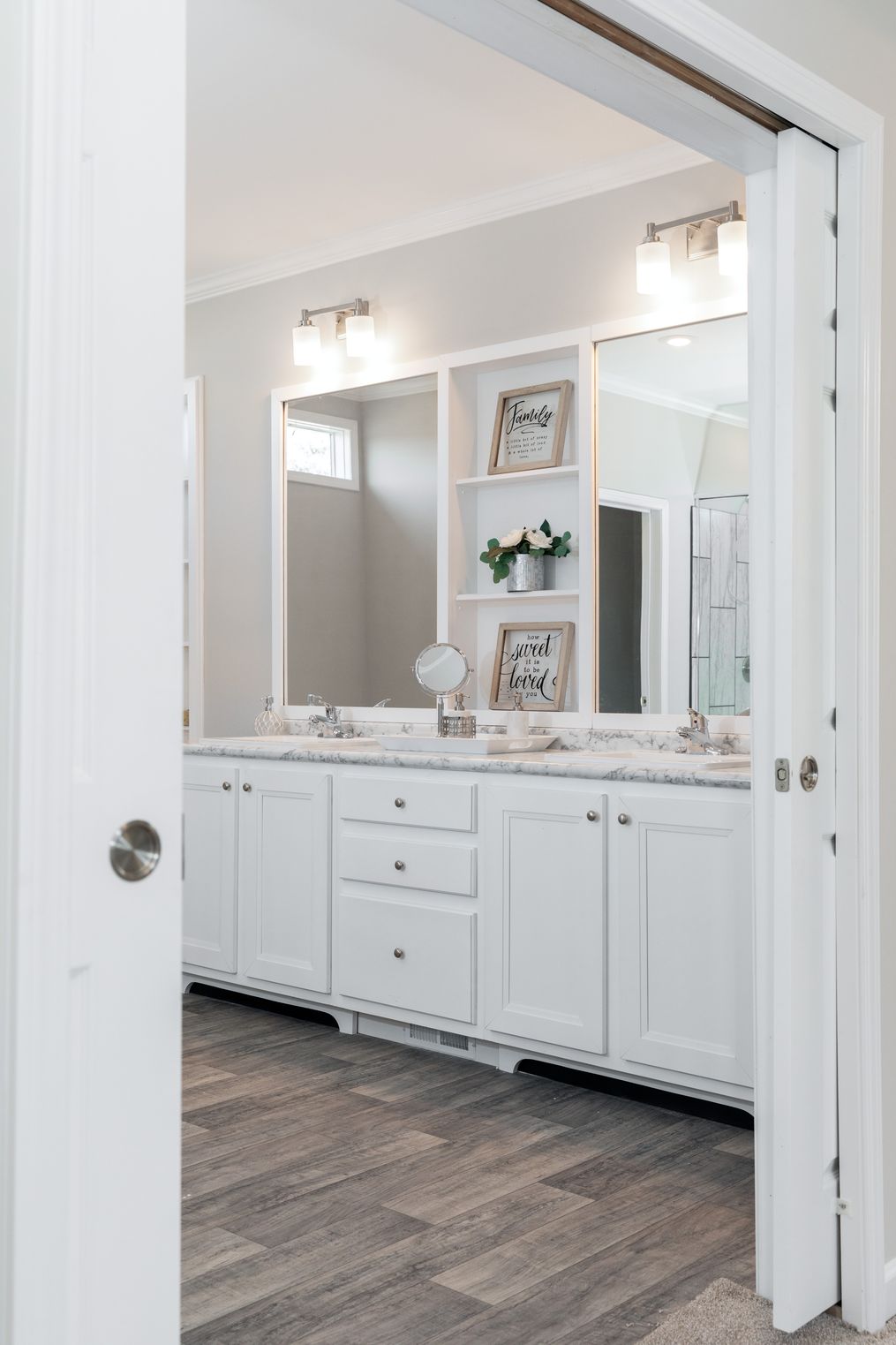 The SUPER 68 ELITE Primary Bathroom. This Manufactured Mobile Home features 3 bedrooms and 2 baths.
