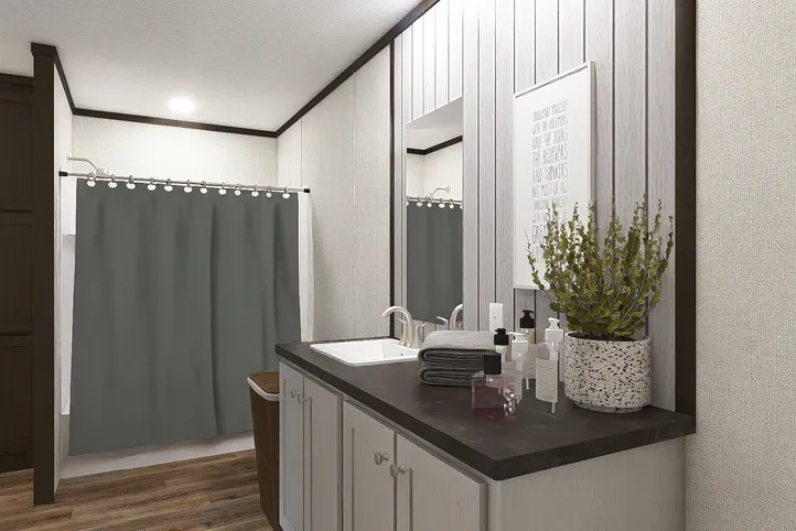 The EMPOWER Primary Bathroom. This Manufactured Mobile Home features 4 bedrooms and 2 baths.
